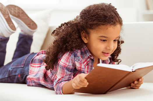 A Child Reading a Book